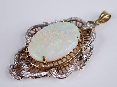 Lot 2265 - A yellow and white metal, opal and diamond...