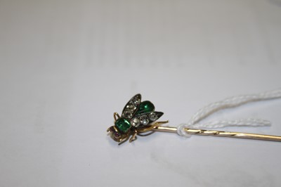 Lot 2196 - A yellow metal diamond, emerald and ruby stick...