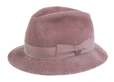 Lot 309 - A 20th century brown wool hat with canvas trim,...