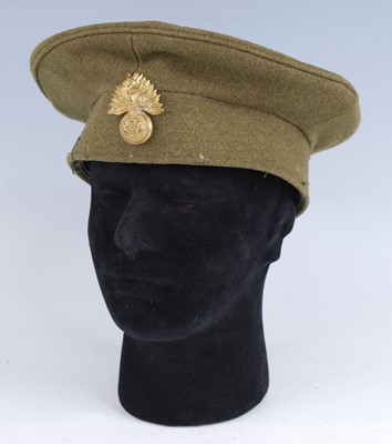 Lot 278 - A Broderick type peakless cap in green with...
