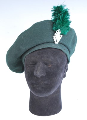 Lot 310 - A Royal Irish Regiment beret with badge and...