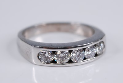 Lot 2293 - A contemporary 18ct white gold diamond half...