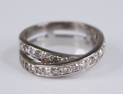 Lot 2292 - A contemporary white metal and diamond double...