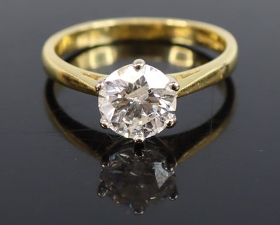 Lot 2351 - An 18ct gold diamond solitaire ring, the...