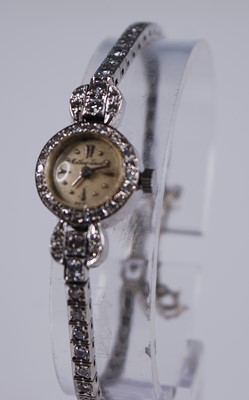 Lot 2314 - A lady's Mathey-Tissot 14ct white gold diamond...