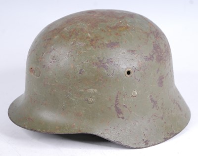 Lot 268 - A Spanish Civil War M1926 steel helmet, with...