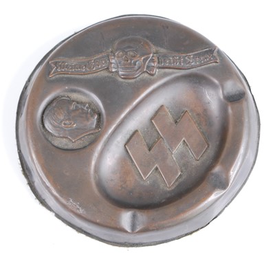 Lot 262 - A German brass alloy ashtray, having a raised...