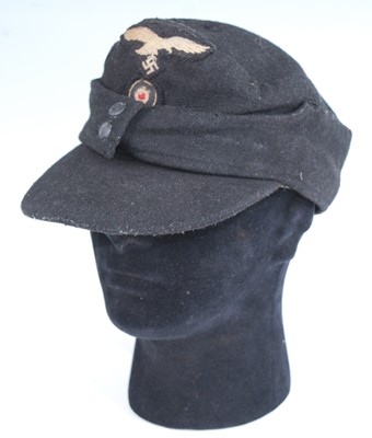 Lot 311 - A German M43 Field cap, in black with...