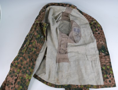 Lot 313 - A German SS camouflage tunic, in dot pattern...