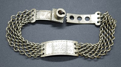 Lot 308 - A 19th century identity bracelet, the central...