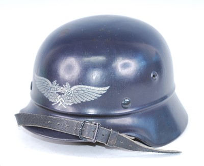 Lot 326 - A German Luftschutz Civil Defence helmet, with...