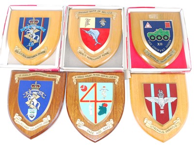 Lot 335 - A small collection of miltary wall plaques, to...