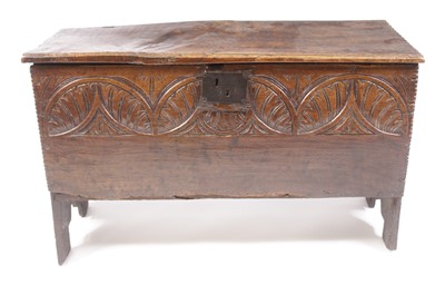 Lot 1170 - A mid-17th century joined oak plank coffer,...