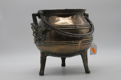 Lot 1 - A 17th century bronze tripod cauldron, having...
