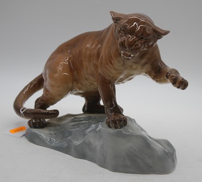 Lot 4 - A Beswick model of a mountain cat, No. 1702,...