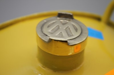 Lot 13 - A reproduction Volkswagen yellow painted oil...