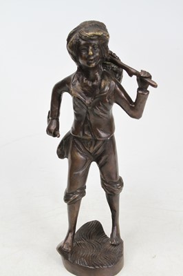Lot 19 - A reproduction cast iron figure of a soldier...
