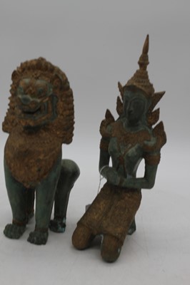 Lot 20 - An eastern verdigris and gilt metal figure of...