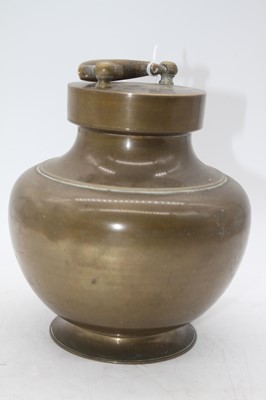 Lot 27 - An Indian brass holy water vessel, of baluster...