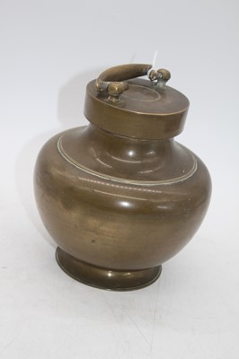 Lot 27 - An Indian brass holy water vessel, of baluster...