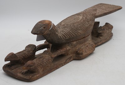 Lot 68 - An African carved wood model of a bird, length...