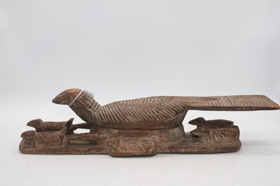 Lot 68 - An African carved wood model of a bird, length...