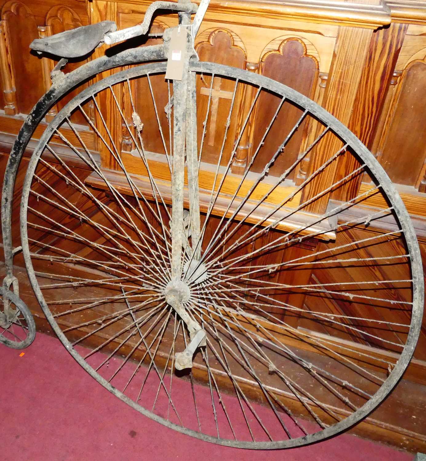 Lot 1125 - An antique wrought iron framed penny farthing...
