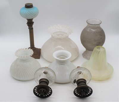 Lot 99 - A collection of Victorian and later oil lamp...