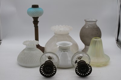 Lot 99 - A collection of Victorian and later oil lamp...