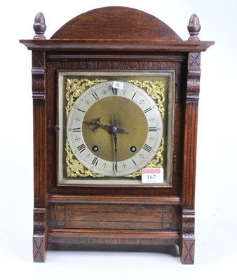 Lot 167 - A brass Dunhill quartz clock, housed in a...