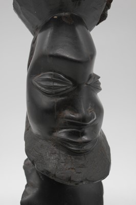 Lot 139 - An African carved hardwood bust of a gentleman,...