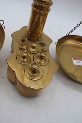 Lot 124 - A set of 19th century brass scales and weights,...