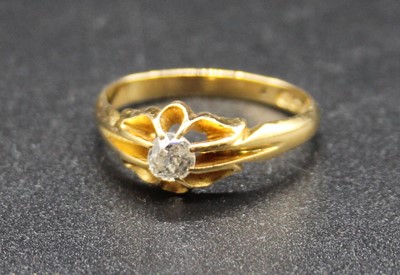 Lot 385 - An 18ct gold diamond solitaire ring, the claw...