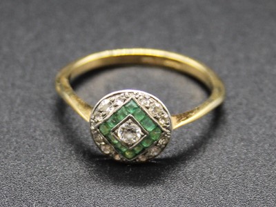 Lot 396 - An Art Deco 18ct gold, emerald and diamond set...