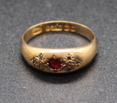 Lot 415 - A vintage 9ct gold, ruby and diamond point set...