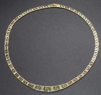 Lot 432 - A modern 14ct gold Greek Key link necklace,...