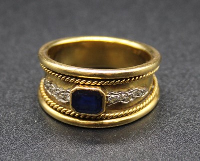 Lot 461 - An 18ct gold, sapphire and diamond set...