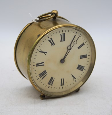 Lot 252 - A brass drum clock, the dial showing Roman...