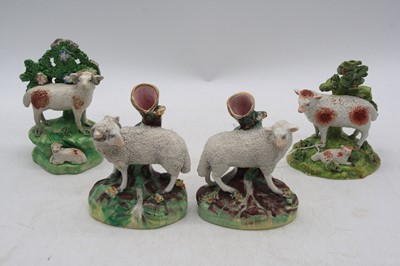 Lot 263 - A 19th century pearlware bocage sheep group, h....