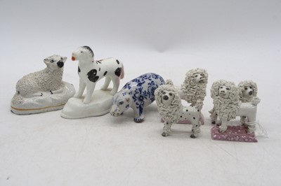 Lot 262 - A 19th century Staffordshire model of a sheep,...