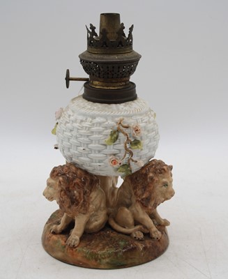 Lot 259 - A Sitzendorf porcelain oil lamp, the...