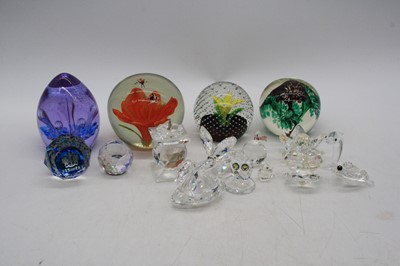 Lot 272 - A collection of vintage glass paperweights and...