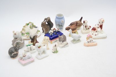 Lot 294 - A collection of miniature pottery animal...