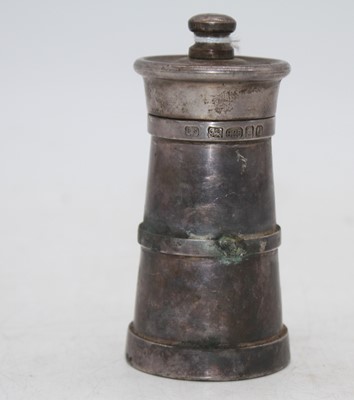 Lot 323 - A modern silver pedestal pepper grinder,...