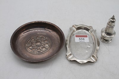 Lot 331 - An Elizabeth II silver Armada type dish, the...