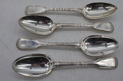 Lot 367 - A set of four George III silver serving spoons...