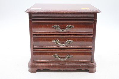 Lot 382 - A modern hardwood jewellery box, the hinged...