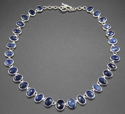 Lot 480 - A contemporary silver and sapphire set...