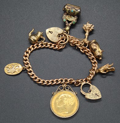 Lot 487 - A 15ct gold curblink bracelet containing a...