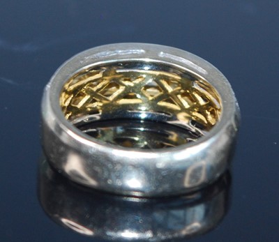Lot 2677 - A yellow metal fancy yellow diamond three-row...